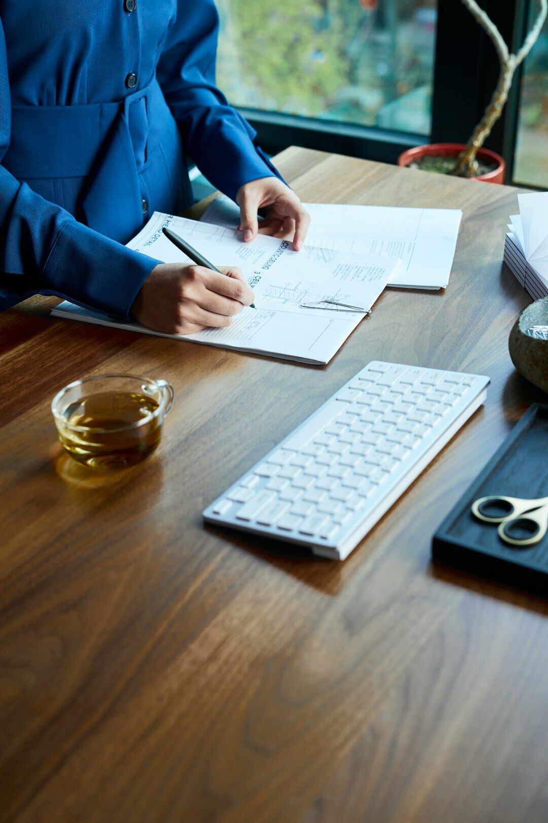woman solving puzzle at desk